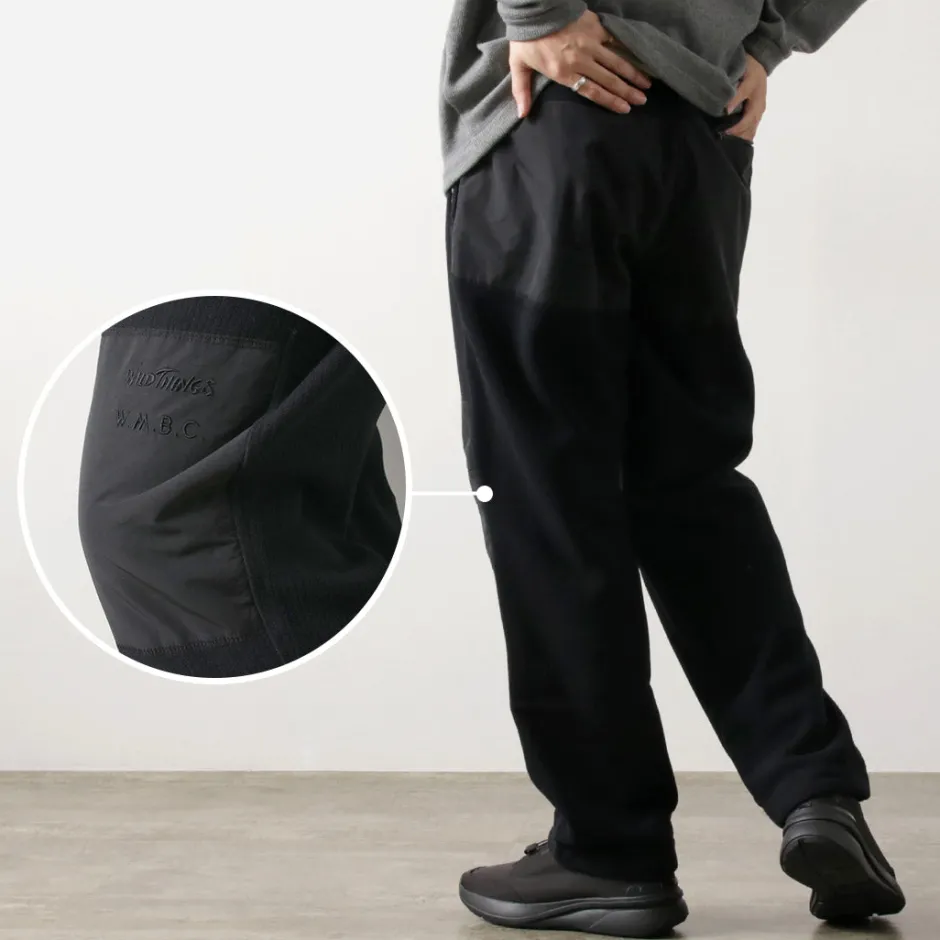 white_mountaineering__wild_things_collaboration_fleece_pants_9.webp Trousers^WHITE MOUNTAINEERING / WILD THINGS Collaboration Fleece Pants black